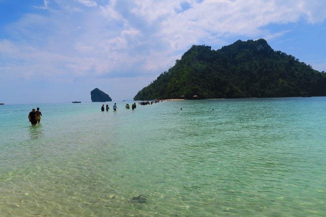 crossing-at-low-tide-in-tup-island-thailand