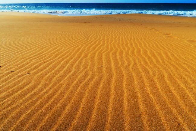 Golden sand in Papohaku Beach - Molokai Hawaii