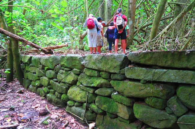 Hakaui Valley Vaipo Waterfall hike ancient structure Nuku Hiva Marquesas Islands French Polynesia