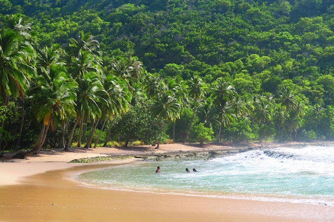 Hanatekuua Bay Hike Hiva Oa Marquesas Islands French Polynesia locals in beach