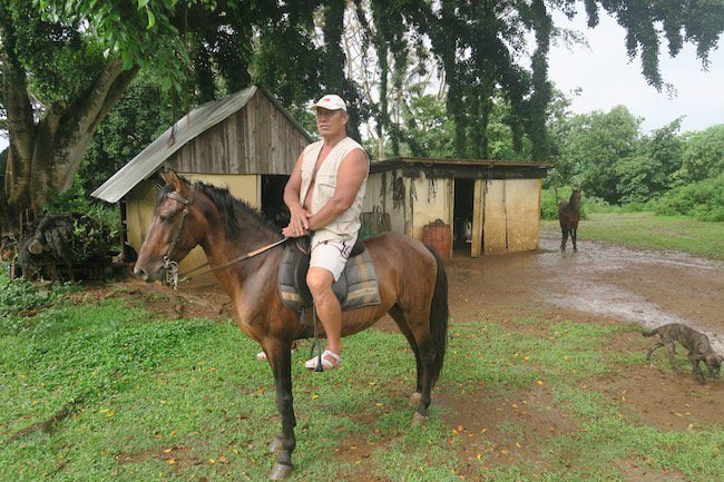 Horseback riding Hiva Oa Marquesas Islands French Polynesia Paco