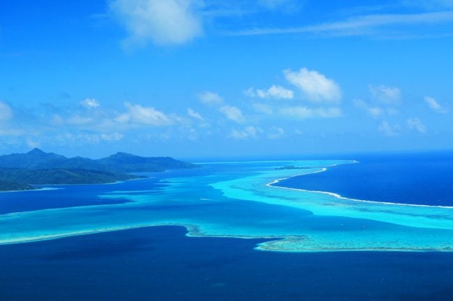 Mount Tapioi hike panoramic view of Tahaa Lagoon Raiatea Island French Polynesia