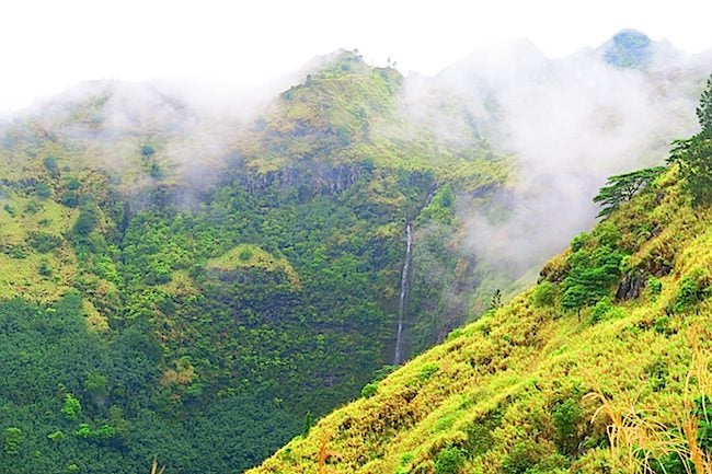 Road from airport Nuku Hiva Marquesas Islands French Polynesia waterfall