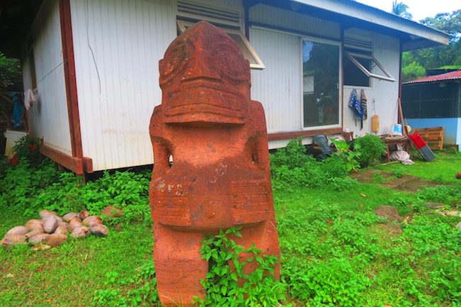 Taiohae village tiki in front of house Nuku Hiva Marquesas Islands French Polynesia