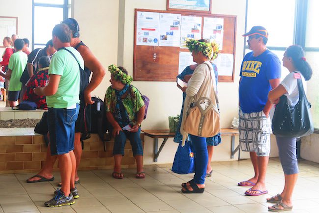 locals at airport Hiva Oa Marquesas Islands French Polynesia