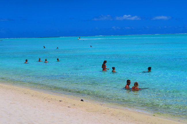 matira beach bora bora french polynesia people in water