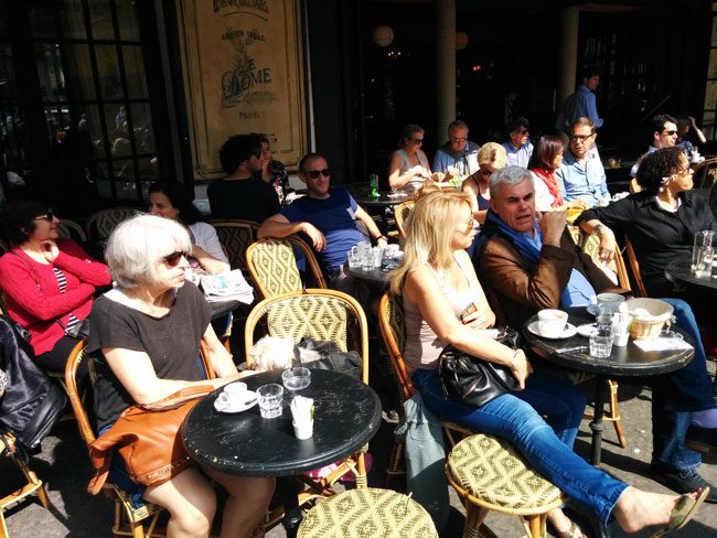 Paris people watching in cafe