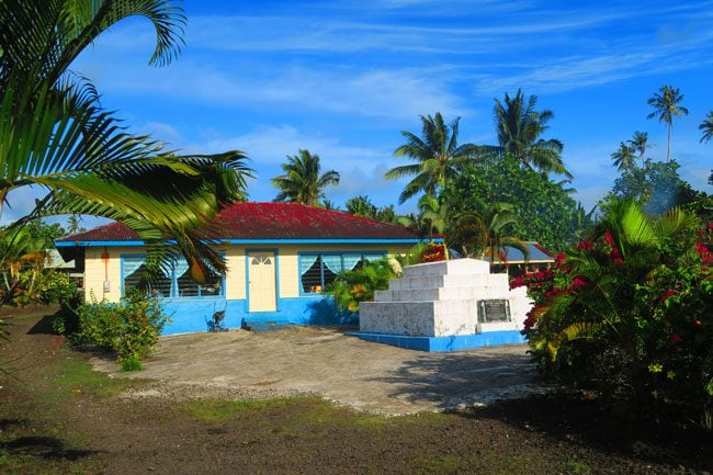 Savaia Traditional Samoan home with grave