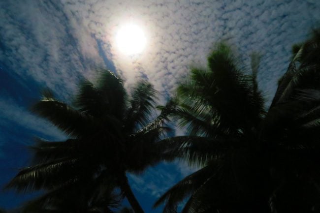 Full moon in Aitutaki lagoon Cook Islands