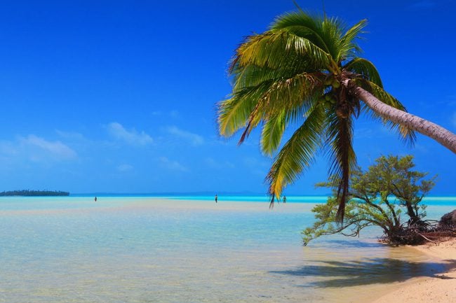 One Foot Island Aitutaki lagoon Cook Islands walking out of lagoon