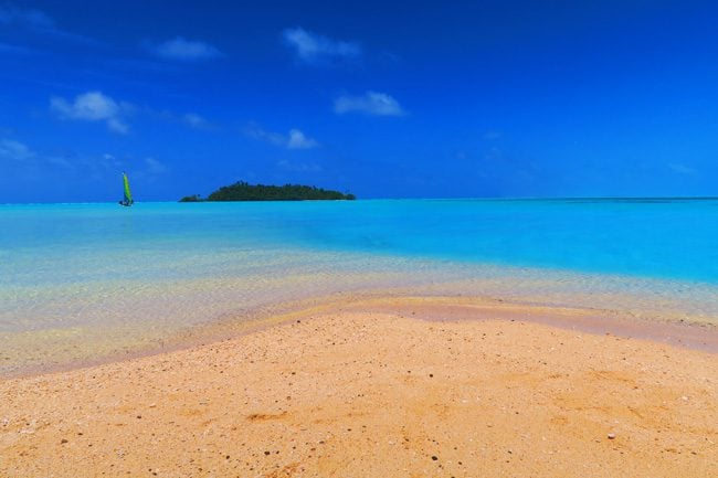 Sandy dune in Motu Rakau tropical island Aitutaki