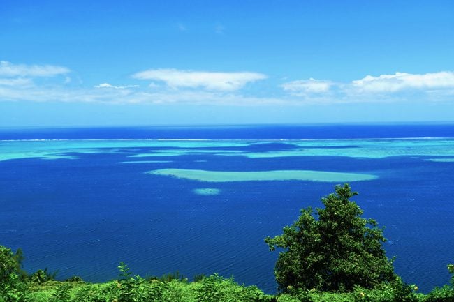 Blue tropical lagoon from Vaipahi gardens Tahiti French Polynesia