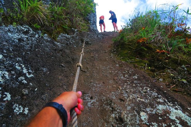 Cross Island Track Rarotonga Cook Islands climbing to needle with rope