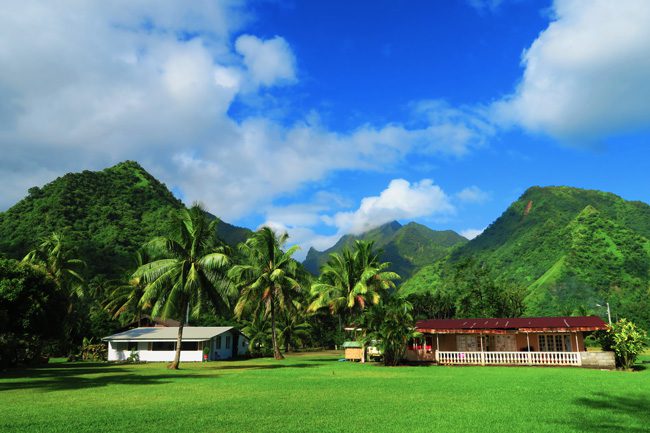 Green mountains in Teahupoo Beach Tahiti French Polynesia