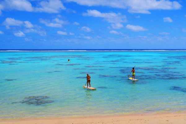 Paddling in Rarotonga Cook Islands paddlers in water