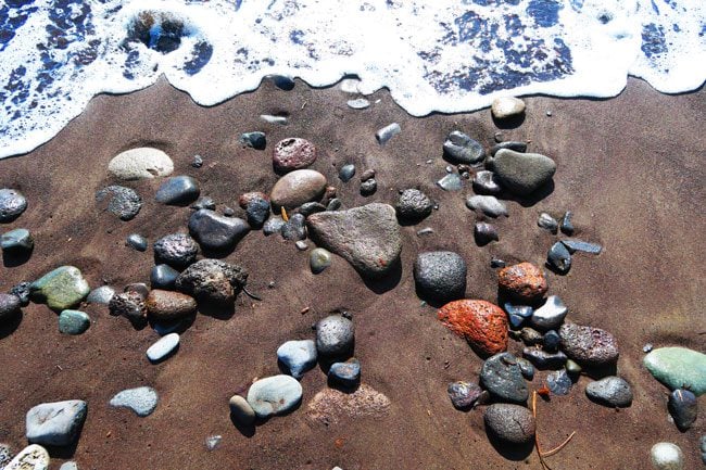 Papara Beach black sand and rocks Tahiti French Polynesia