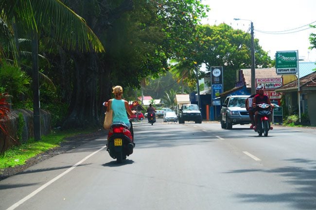 Riding scooter in Cook Islands