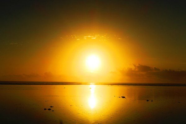 Sunset in Rarotonga Cook Islands large sun dropping