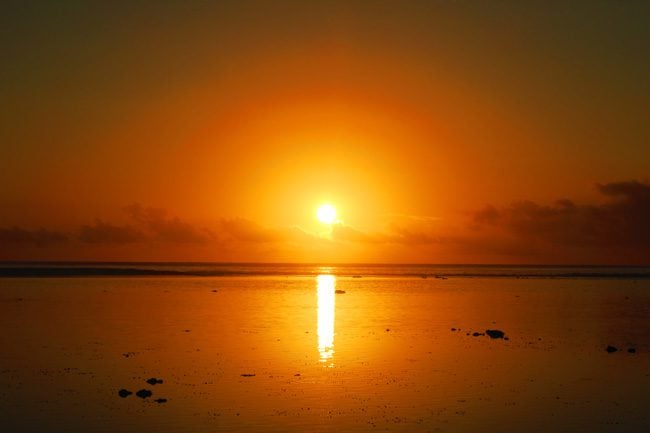 Sunset in Rarotonga Cook Islands sun with ray of light