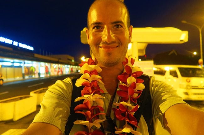 Tahitian flower necklace at airport