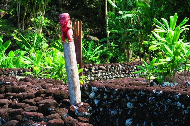 Tiki statue in Marae Tahiti French Polynesia