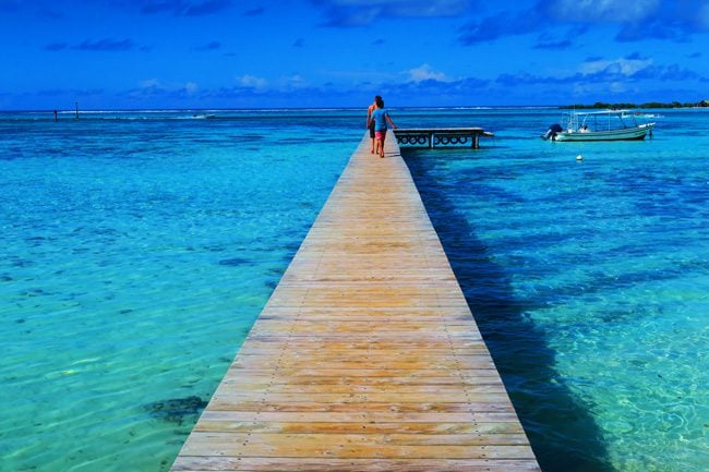 Motu beach Les Tipaniers Moorea French Polynesia pier