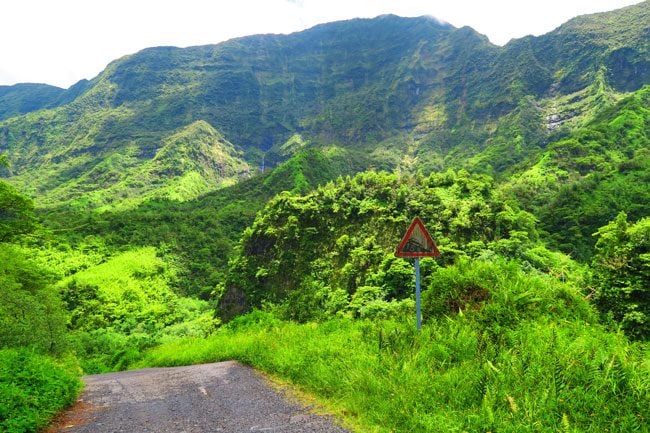 Papenoo valley Tahiti waterfall and steep road sign