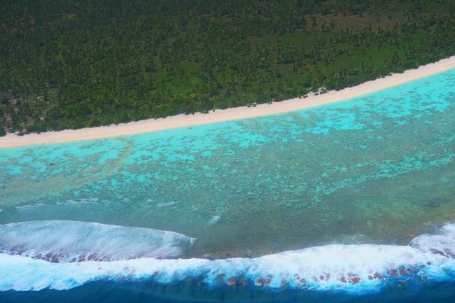 Aerial view of Maupiti French Polynesia motu and reef