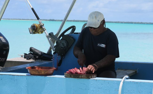 Lagoon tour in Maupiti French Polynesia gabi cutting tuna