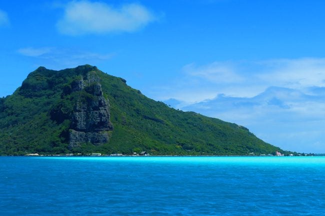 Lagoon tour in Maupiti French Polynesia view of Maupiti from lagoon