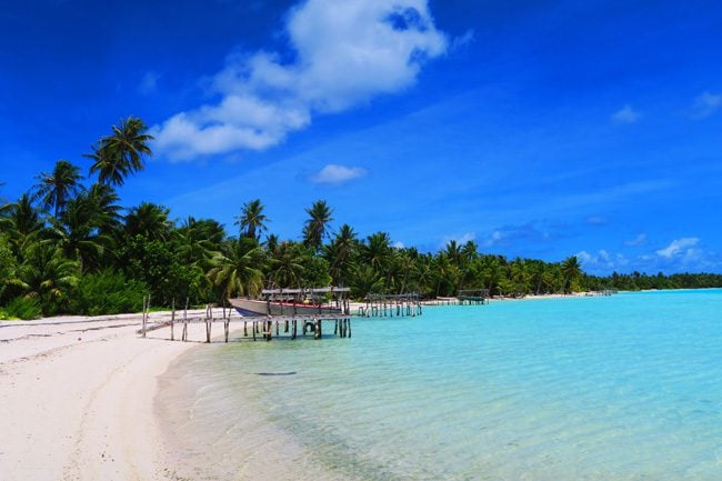 Motu Auira Maupiti French Polynesia pristine beach with boats