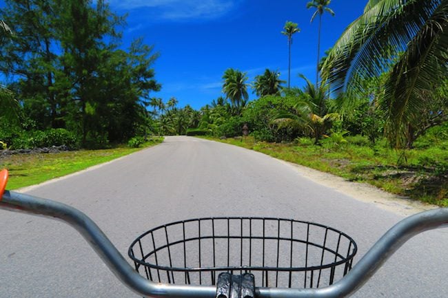 Riding bicycle in Fakarava Atoll French Polynesia