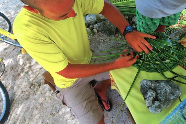 Weaving hat from coconut leaves Fakarava Atoll French Polynesia