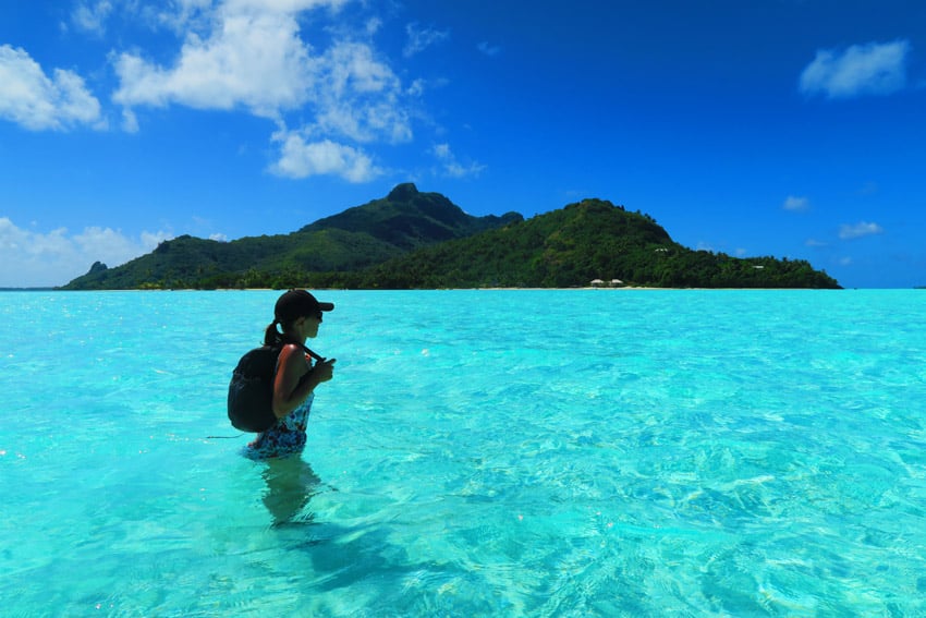 Motu Auira Maupiti French Polynesia - crossing lagoon on foot