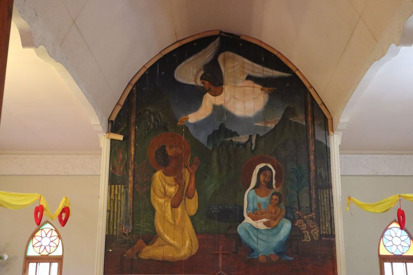 Polynesian jesus and mary mural St Josephs church Moorea French Polynesia