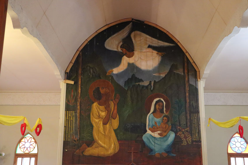 Polynesian jesus and mary mural St Josephs church Moorea French Polynesia