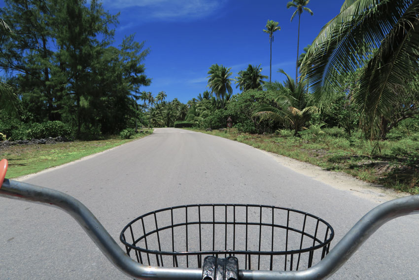 Riding bicycle in Fakarava Atoll French Polynesia