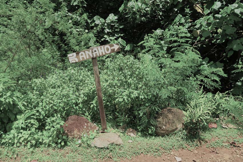 sign to hike to anaho bay Nuku Hiva French Polynesia