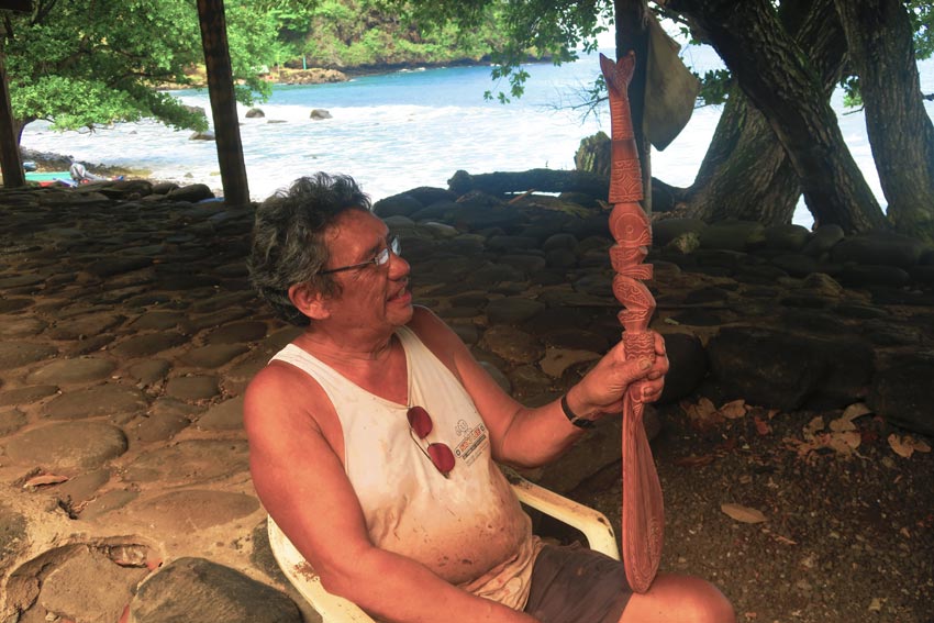 wood carver in tahuata island marquesas islands french polynesia