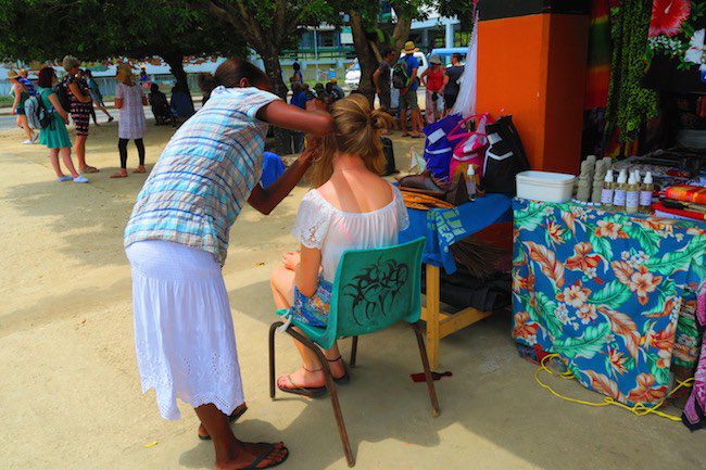 Hair braiding in Port Vila Central Market - Vanuatu