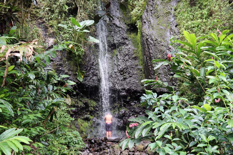 Papenoo Valley Tahiti French Polynesia - swimming in waterfall