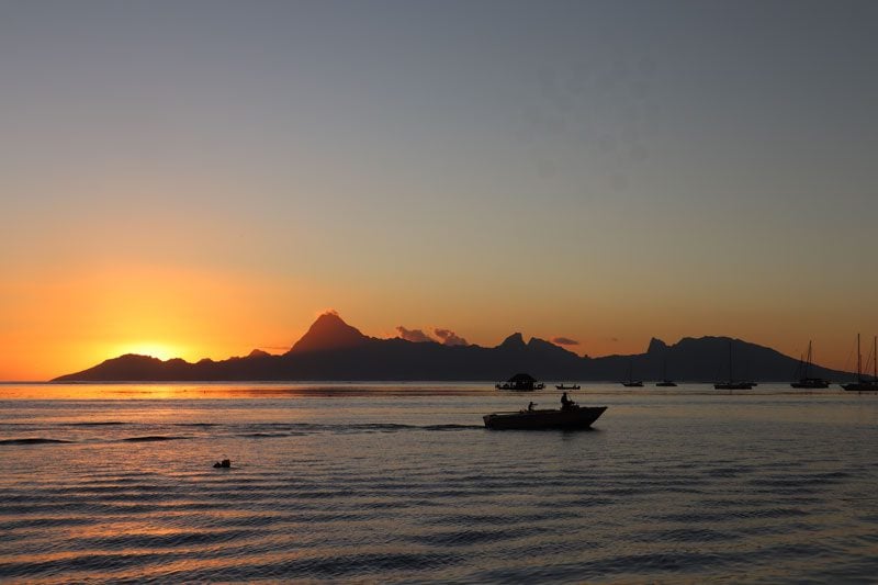 Sunset over Moorea from Tahiti - French Polynesia