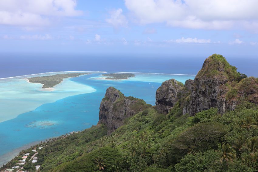 View of Maupiti lagoon pass from Mount Teurafaatiu hike - French Polynesia