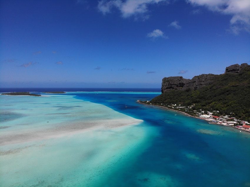 View of Vaiea Village and lagoon from Mount Teurafaatiu hike - French Polynesia - Maupiti