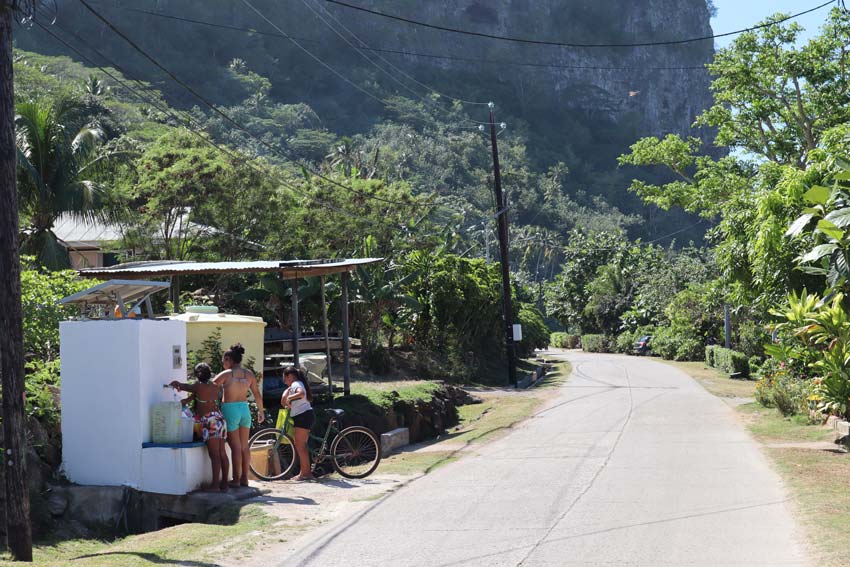 locals getting water in Maupiti French Polynesia