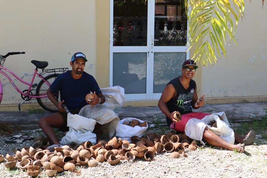 locals making copra in Maupiti French Polynesia