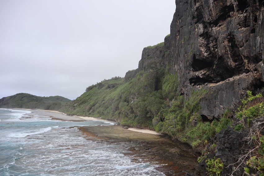 Raised coral cliffs with caves - rurutu - austral islands - french polynesia