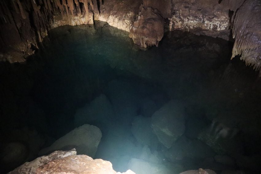 natural pool 2 in secret cave - rurutu - austral islands - french polynesia