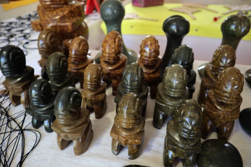 stone tiki statues in artist market - Ua Pou - Marquesas Islands - French Polynesia