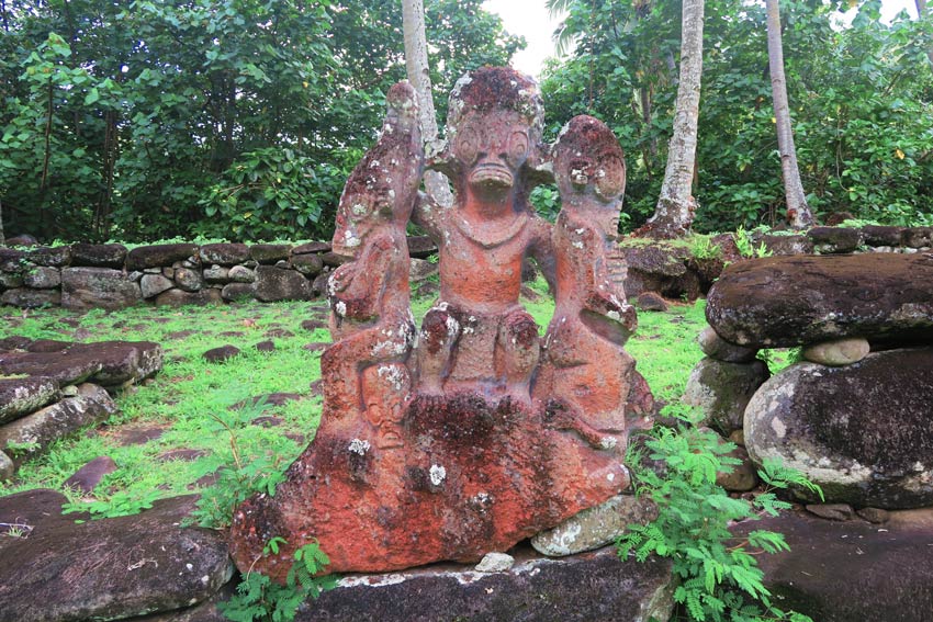 three headed stone statue nuku hiva marquesas islands french polynesia